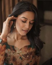 Romeo Actress Mirnalini Ravi in a Floral Printed Flowy Dress Photos 03
