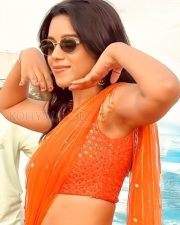 Sexy Mirnalini Ravi Armpit in an Orange Saree with Sleeveless Blouse Photos 03