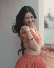 Sexy Mirnalini Ravi in a Orange Lehenga Photos 03