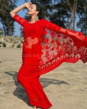 Actress Harshika Poonacha in a Red Saree Stills 02