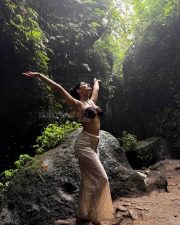 Alcohol Actress Ruhani Sharma in a Chocolate Brown Ruched Bandeau Bikini Top with a Halter Neck Tie with a Loose White Palazzo Pants Pictures 03