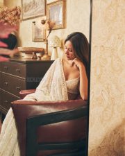 Attractive Sonam Bajwa in a White Floral Embroidered Saree with a Matching Deep V Neckline Sleeveless Blouse Pictures 03