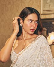 Attractive Sonam Bajwa in a White Floral Embroidered Saree with a Matching Deep V Neckline Sleeveless Blouse Pictures 09