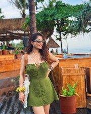 Beautiful Damsel Ruhani Sharma in a Green Bodycon Mini Dress Pictures 02