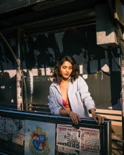 Captivating Ruhani Sharma in a Body Hugging Halter Neck Dress with a Pink Bralette and Torn Jeans Photos 02
