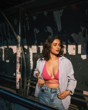 Captivating Ruhani Sharma in a Body Hugging Halter Neck Dress with a Pink Bralette and Torn Jeans Photos 03