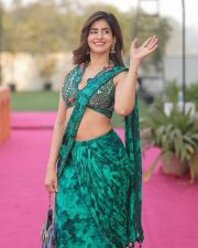 Charismatic Sakshi Malik in a Green Printed Pre Draped Saree with a Halter Neck Blouse Pictures 02
