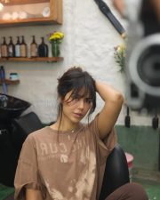 Charming Actress Sonam Bajwa in a Brown Graphic Oversized Tee Photos 01