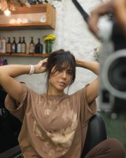 Charming Actress Sonam Bajwa in a Brown Graphic Oversized Tee Photos 03