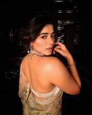 Charming and Elegant Ketika Sharma in a Cream Saree with a Halter Neck Semi Backless Blouse Photos 08