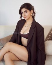 Chic and Bold Sakshi Malik in a Loose Oversized Dark Chocolate Blazer with a Brown Bustier Crop Top with Checked Mini Shorts Photos 03