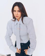 Classy Sonam Bajwa in a Grey and White Pinstriped Button Down Shirt with a Matching Necktie and Black High Waisted Trousers Pictures 02