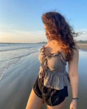 Curvy Beach Beauty Ketika Sharma in a Grey Top with Black Denim Pictures 06