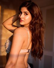 Dazzling Actress Sakshi Malik in a Pearl Embellished Crop Top And Skirt Photos 07