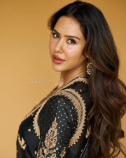 Dazzling Actress Sonam Bajwa in a Black Gold Embroidered Sharara Suit Photos 03
