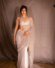 Dazzling Sakshi Malik in a White Embellished Saree with a Halter Neck Blouse Photos 03