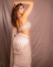 Dazzling Sakshi Malik in a White Embellished Saree with a Halter Neck Blouse Photos 07