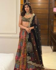Dry Day Actress Sakshi Malik in a Black Embroidered Sweetheart Silk Blouse with a Brocade Collage Lehenga and Embellished Sheer Dupatta Photos 04