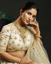 Elegant Actress Ruhani Sharma in a White Embroidered Lehenga Photos 01