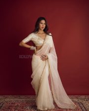 Elegant and Sexy Sonam Bajwa in an Off White Saree with Gold Embroidery and Gota Patti Blouse Photos 09