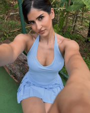 Eleven Actress Sakshi Malik in a Light Blue Halter Neck Sports Top And Pleated Mini Skirt Photos 03