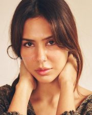 Enchanting Actress Sonam Bajwa in a Dark Paisley Print Wrap Blouse Photos 01