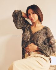 Enchanting Actress Sonam Bajwa in a Dark Paisley Print Wrap Blouse Photos 02