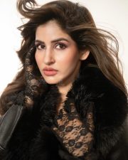 Glam Babe Sakshi Malik in a Black Leather Coat Mini Dress and Knee High Boots Photos 07