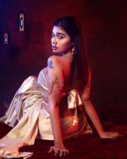 Glamorous Dharsha Gupta in a Golden Saree with Strapless Blouse Photos 01