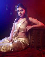 Glamorous Dharsha Gupta in a Golden Saree with Strapless Blouse Photos 02