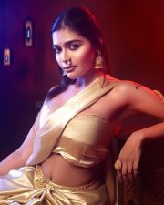 Glamorous Dharsha Gupta in a Golden Saree with Strapless Blouse Photos 03