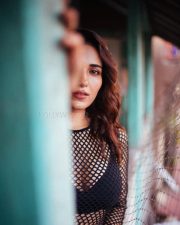 Gorgeous Ruhani Sharma in a Mesh Top and Black Bra Photos 01