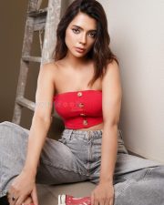 Hot Ruhi Singh in a Red Strapless Crop Top with Grey Jeans Photos 01