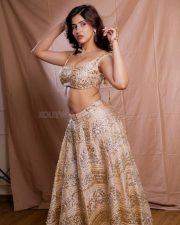 Hot Sakshi Malik in a Beige Golden Embroidered Lehenga Photos 04