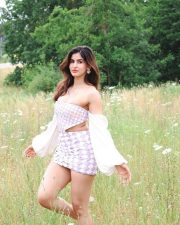 Hot and Sexy Sakshi Malik in a Lilac Off Shoulder Top with a Mini Skirt Photos 01