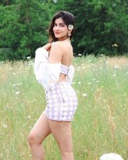 Hot and Sexy Sakshi Malik in a Lilac Off Shoulder Top with a Mini Skirt Photos 04