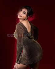 Luminous Actress Rittika Chakraborty in a Gold Metallic Backless Dress Photos 05
