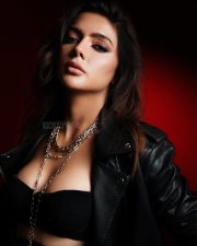 Mastiii 4 Actress Ruhi Singh in a Classic All Black Faux Leather Jacket with a Black Mini Skirt and Black Bralette Crop Top Pictures 03