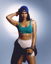 Powerful Actress Sonam Bajwa in a Teal Sports Bra and White Shorts Photos 01