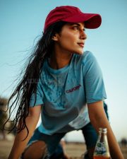 Radiant Actress Ruhani Sharma in a Blue California Graphic Tee Photos 04