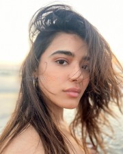 Ravishing Ketika Sharma in a Sleeveless Tube Top and Mini Skirt at the Beach Photos 01