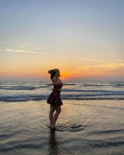 Ravishing Ketika Sharma in a Sleeveless Tube Top and Mini Skirt at the Beach Photos 04