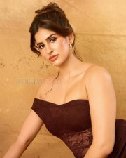 Seductive Actress Sakshi Malik in a Burgundy Off Shoulder Lace Dress Photos 01