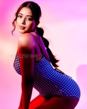 Sensual Rittika Chakraborty Cleavage in a Blue Checkered Swimsuit with Red Trim Photos 10