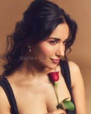 Sensual Ruhani Sharma in a Black Strappy Gown with a Red Rose Pictures 01