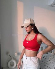 Sexy Hot Ruhani Sharma in a Red Sports Bra and White Pants Pictures 02