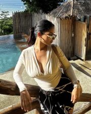Sexy Ruhani Sharma in a V Neck Crop Top Holiday Pictures 01