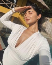 Sexy Ruhani Sharma in a V Neck Crop Top Holiday Pictures 03