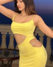 Sexy Sakshi Malik in a Lime Strappy Multi Waist Cut Out Midi Dress Photos 02