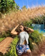 Sizzling Ketika Sharma in a Cream Colored Halter Neck Crop Top with a Blue Mini Skirt Photos 10 Sizzling Ketika Sharma in a Cream Colored Halter Neck Crop Top with a Blue Mini Skirt Photos 10